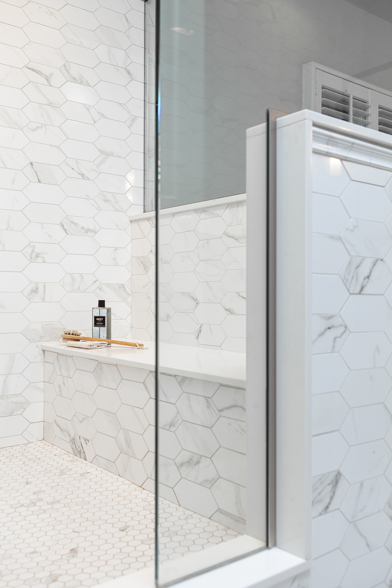 glass wall detail in primary shower