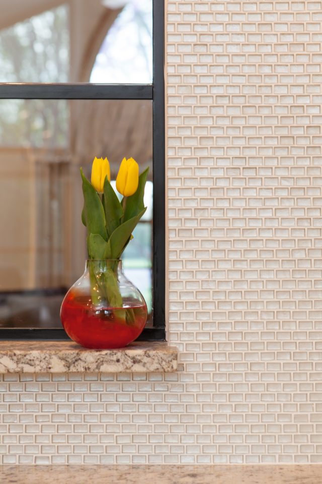 Textural Mosaic Tile Backsplash with Granite Shelf