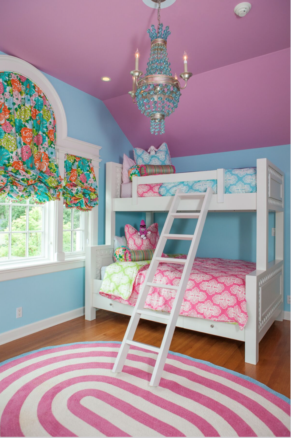 white bunkbeds in colorful child's bedroom