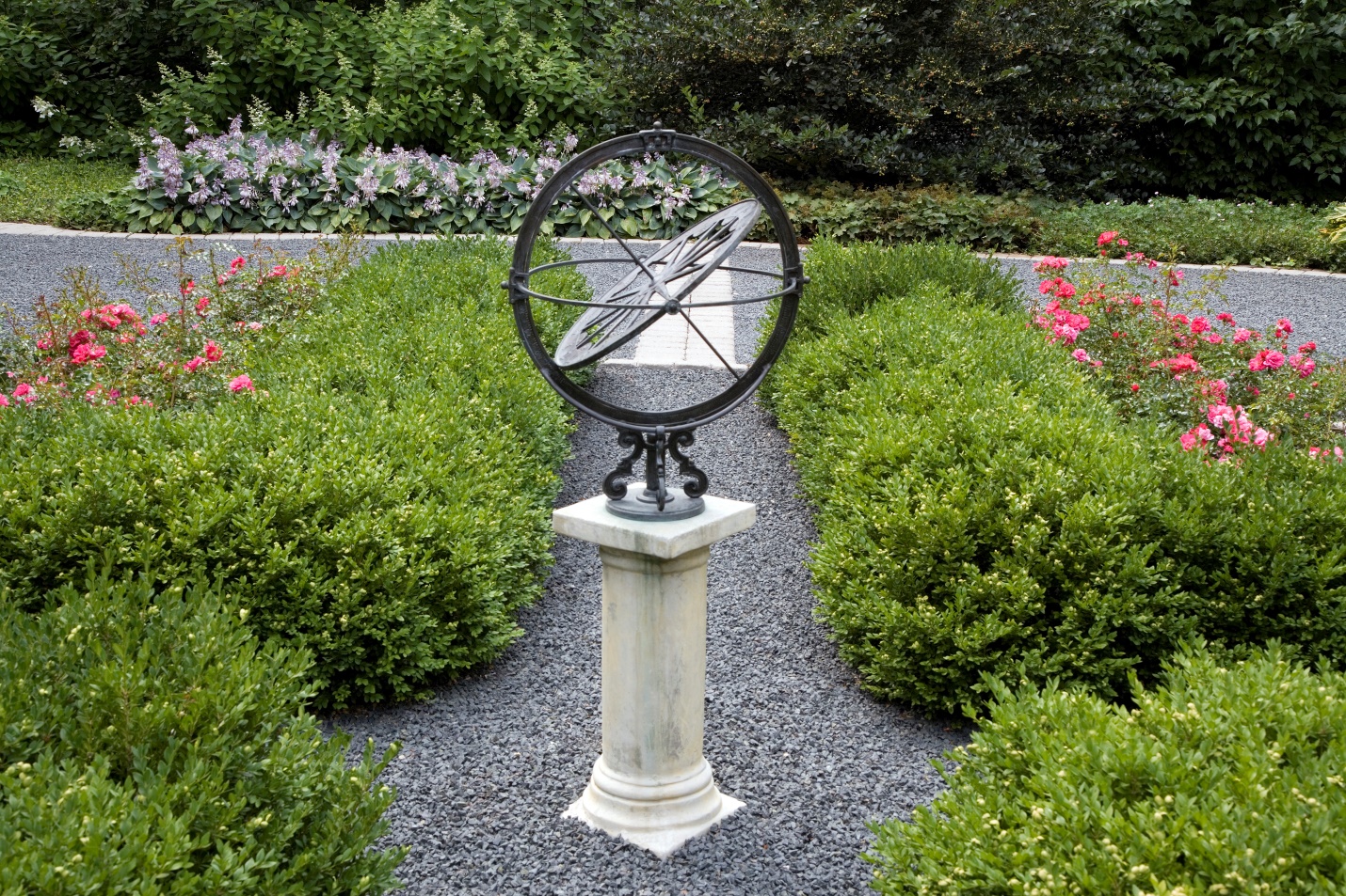 garden art on pedestal