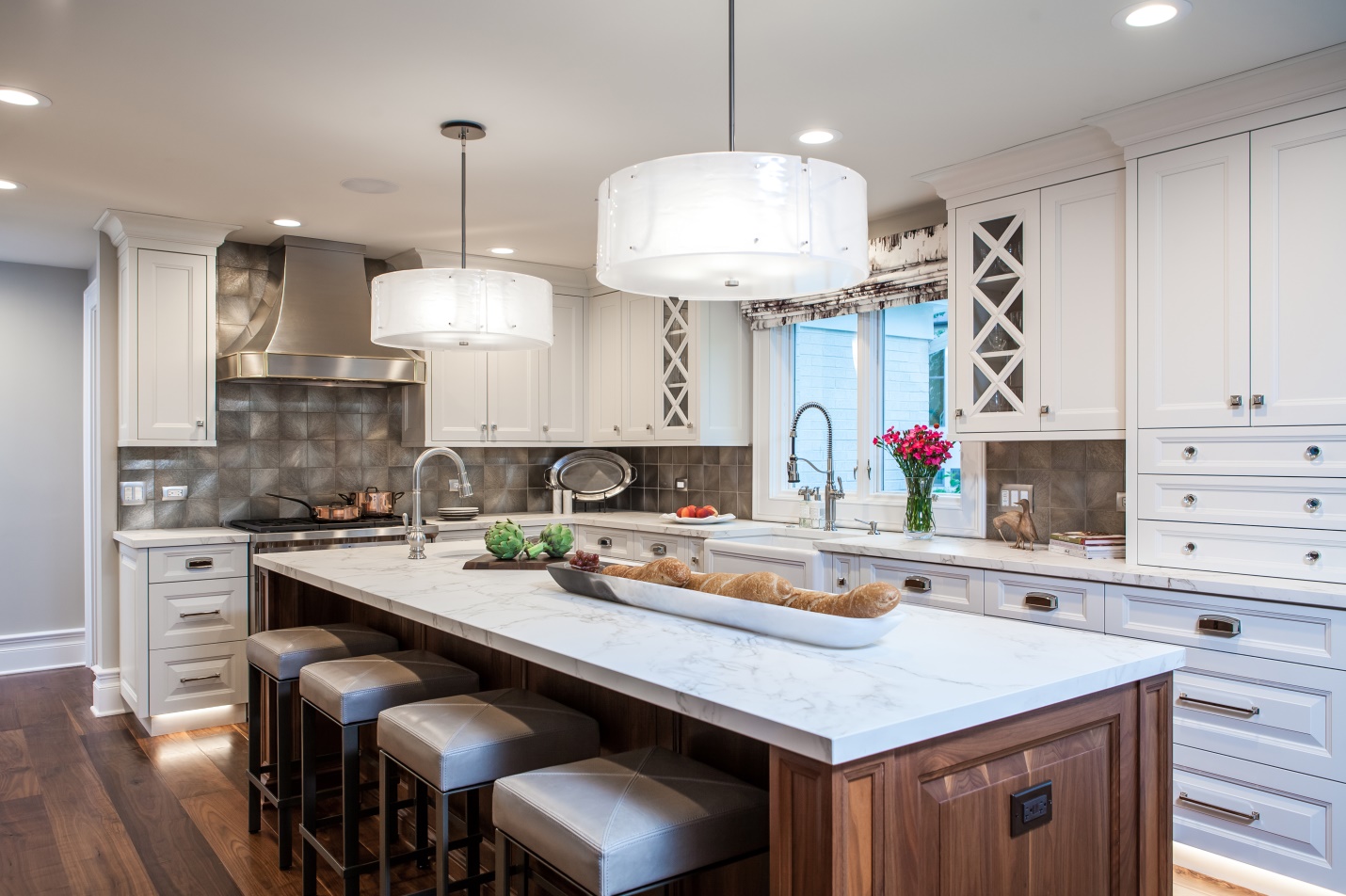 opaque qhite glass pendants over kitchen island