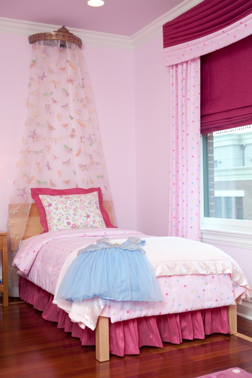 pink bedroom with crown top