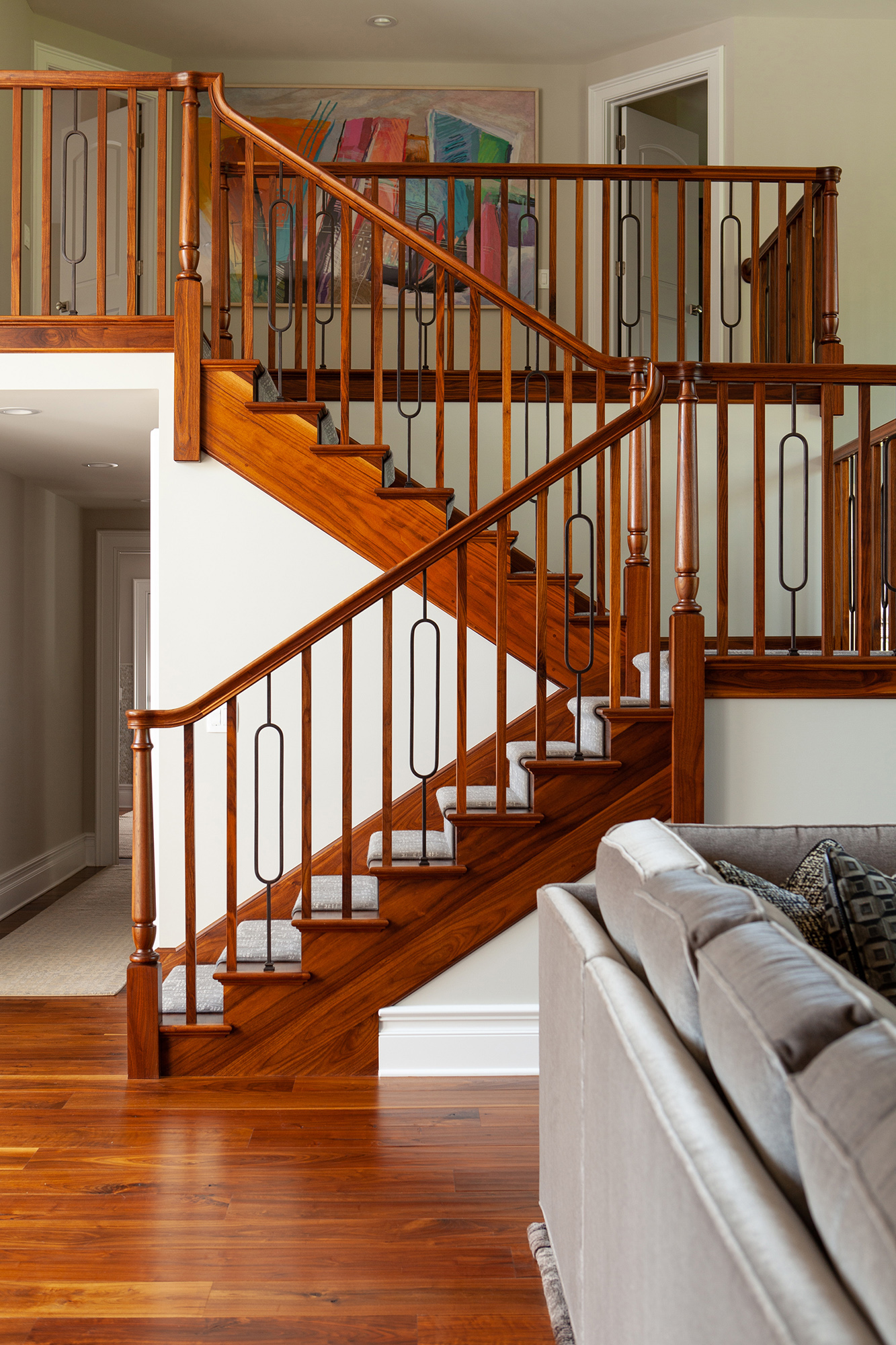 staircase with metal and wood ballusters